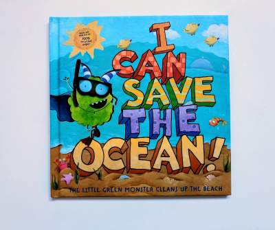 A close up of a book called, I Can Save the Ocean!  