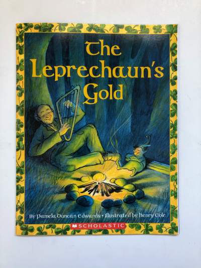 A old man playing a harp.   St. Patrick's Day book called, The Leprechaun's Gold. 